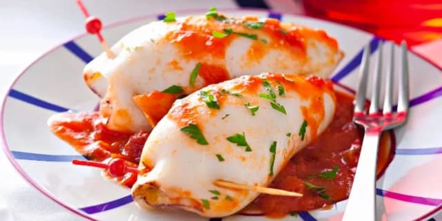 Recette d'encornets farcis aux fruits de mer : savoureuse et facile à préparer Recette d'encornets farcis aux fruits de mer : savoureuse et facile à préparer